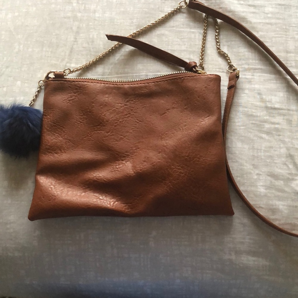 Brown crossbody bag that can turn into a clutch